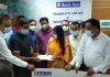 সিরাজদিখানে পাবলিক লাইব্রেরীতে ব্যাংক এশিয়ার অনুদান চেক প্রদান